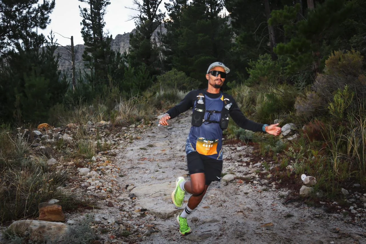 Runner racing over rocky ground