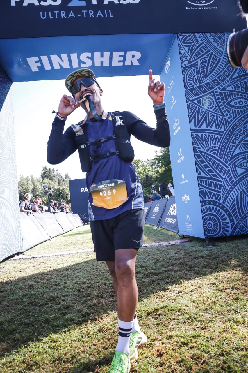 Athlete Jason celebrating a Pass2Pass Ultra-Trail finish