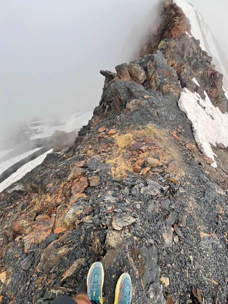 Exposed ridge scramble during a mountain ultra