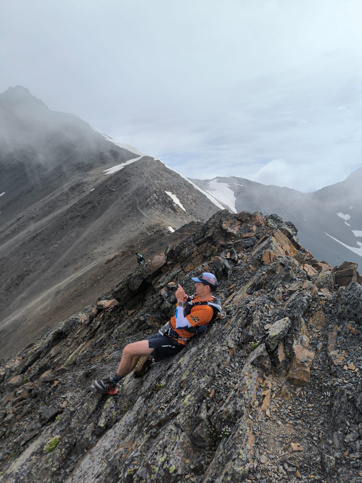 Scrambling an exposed rocky ridge in fog